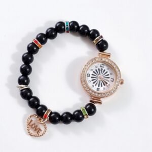 Fashionable ladies beads bracelet watch featuring decorative beads and jewelry-style design available at Albashar Store Pakistan.